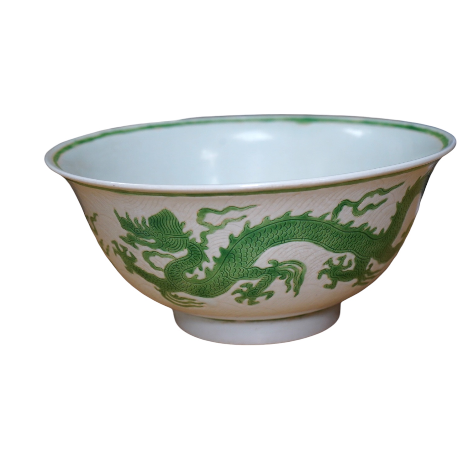 A Chinese famille verte dragon bowl, 21cm in diameter. Condition - good